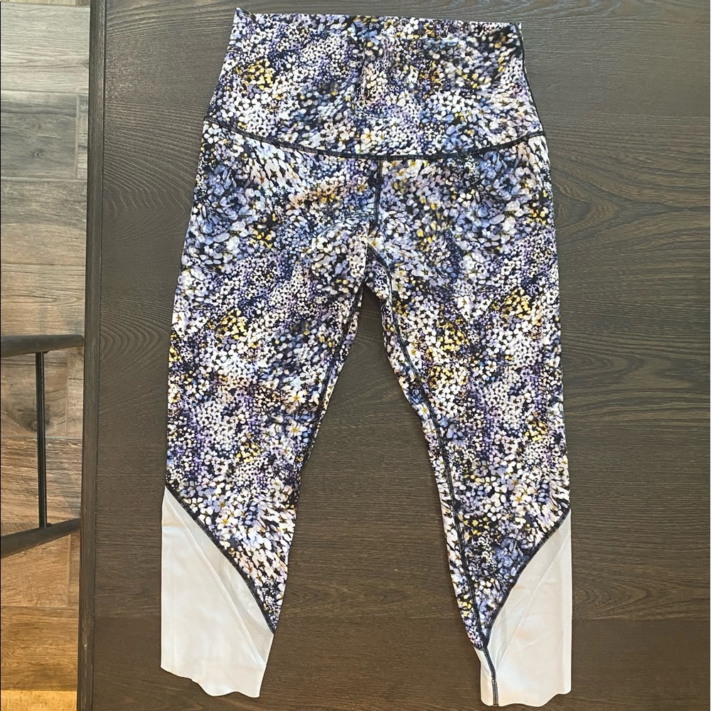 Lululemon high rise floral legging with scalloped ankle.